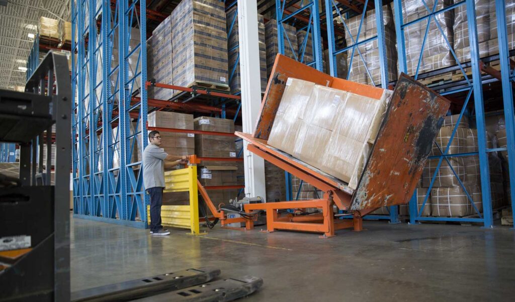 Employee working in the warehouse at Michael Lewis Co.