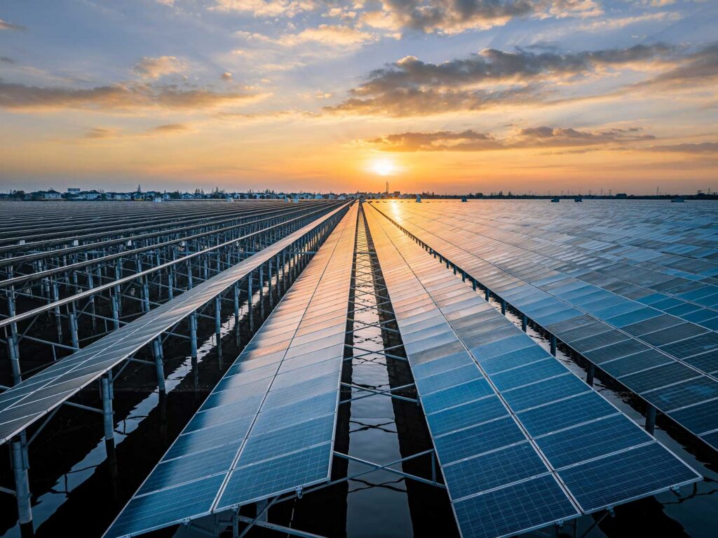 solar panels on a rooftop at sunrise
